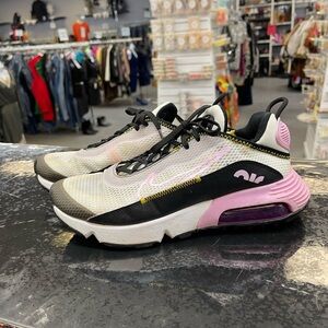 Nike Athletic Shoes in Black, White, and Pink